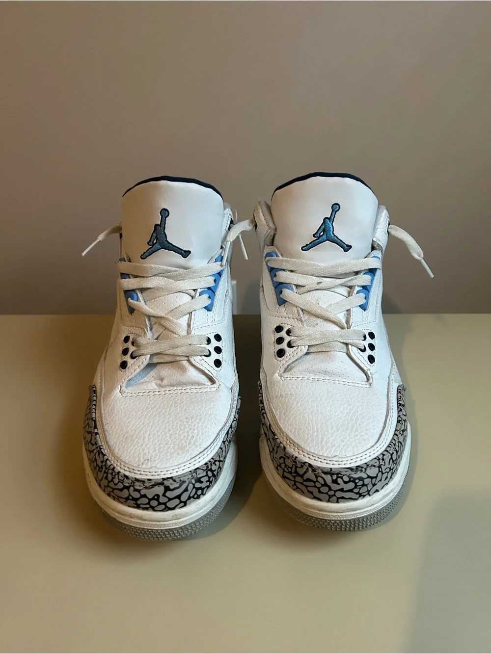 Jordan White and Light Blue Elephant Print High-Top Sneakers